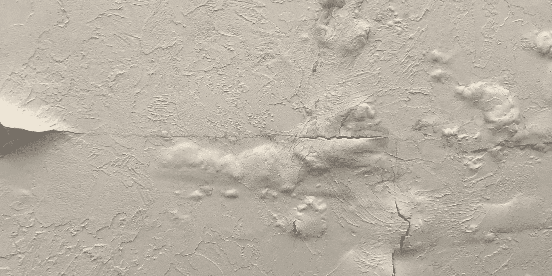 Ceiling bubbled up from a leak in the ceiling making the paint chip