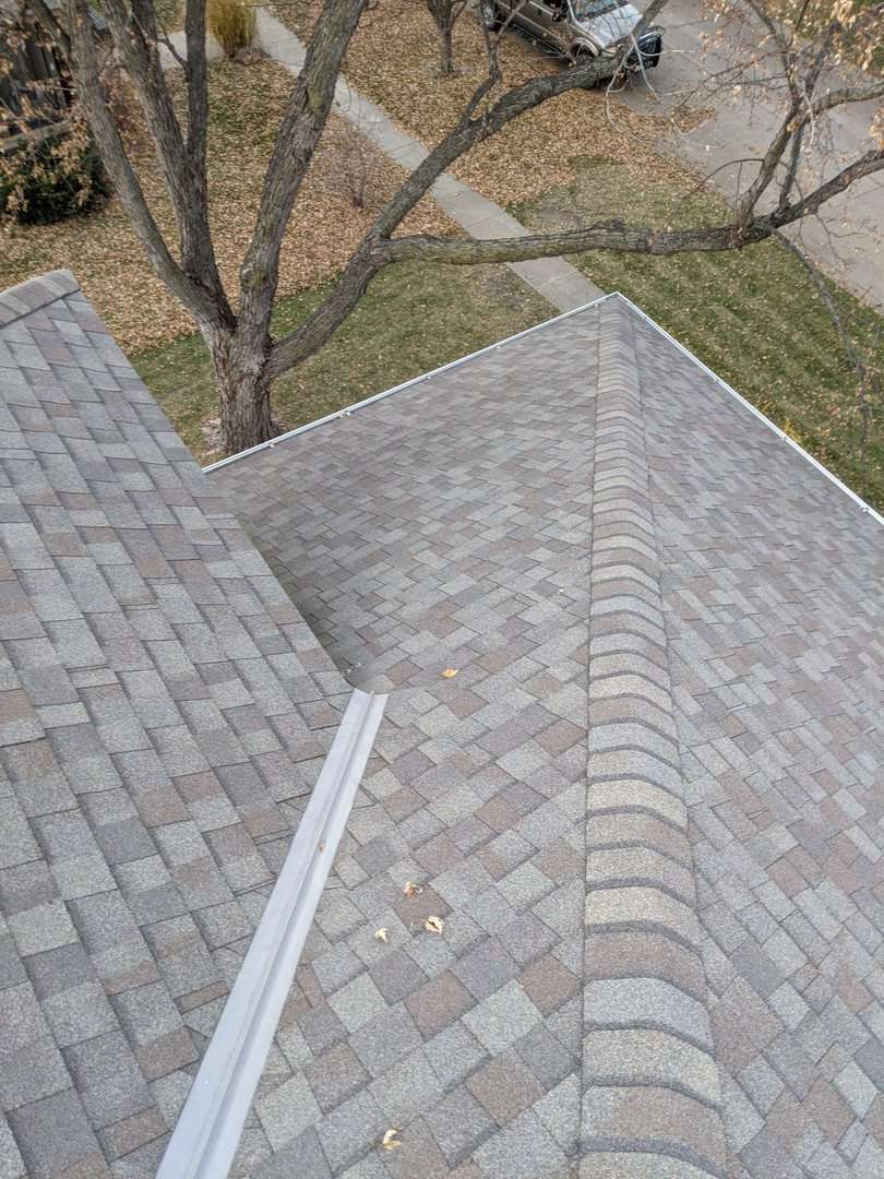 Close up image of an asphalt shingle roof on a Denver home