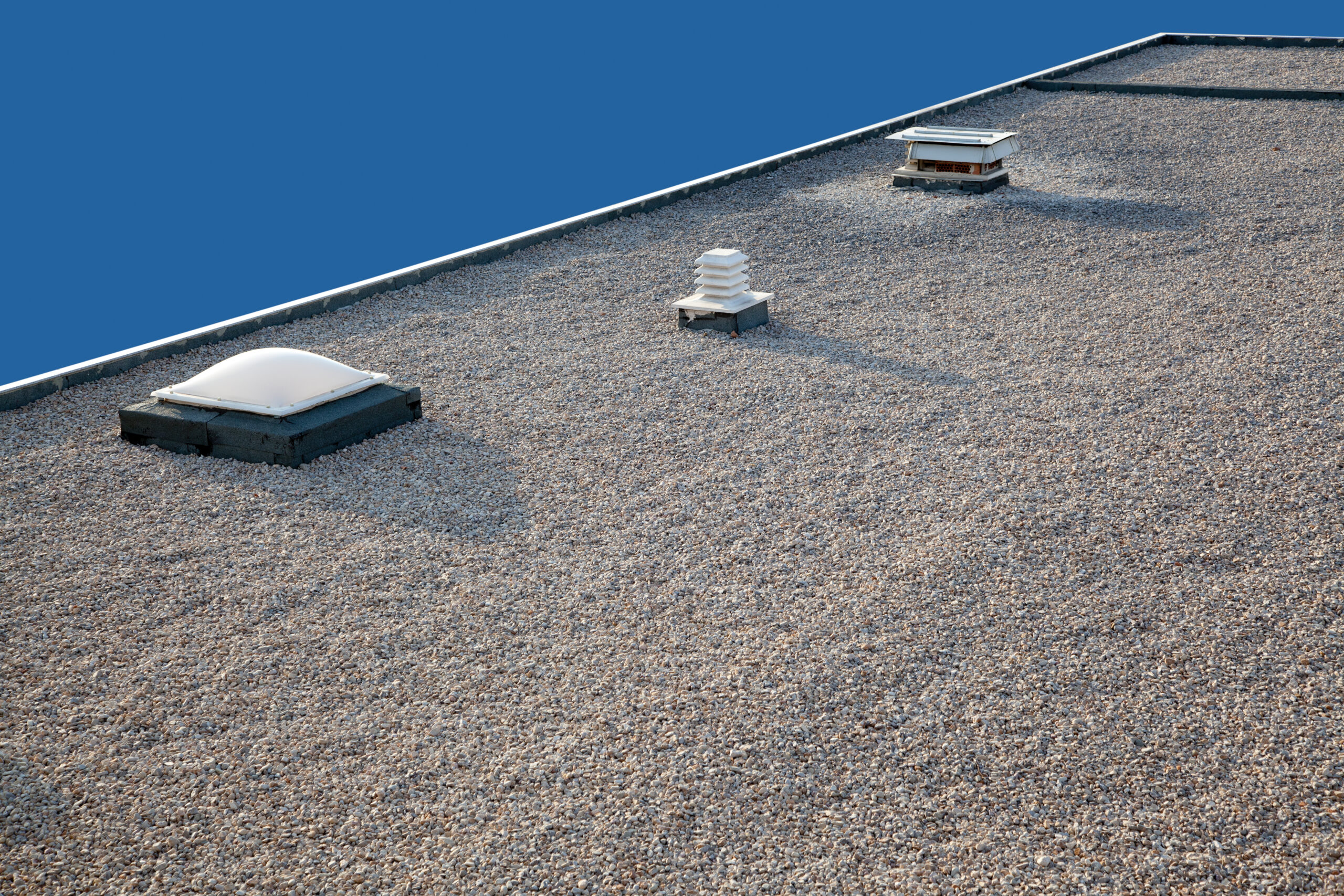 Flat roof on a multifamily building after a charlotte roofing company replaced roof
