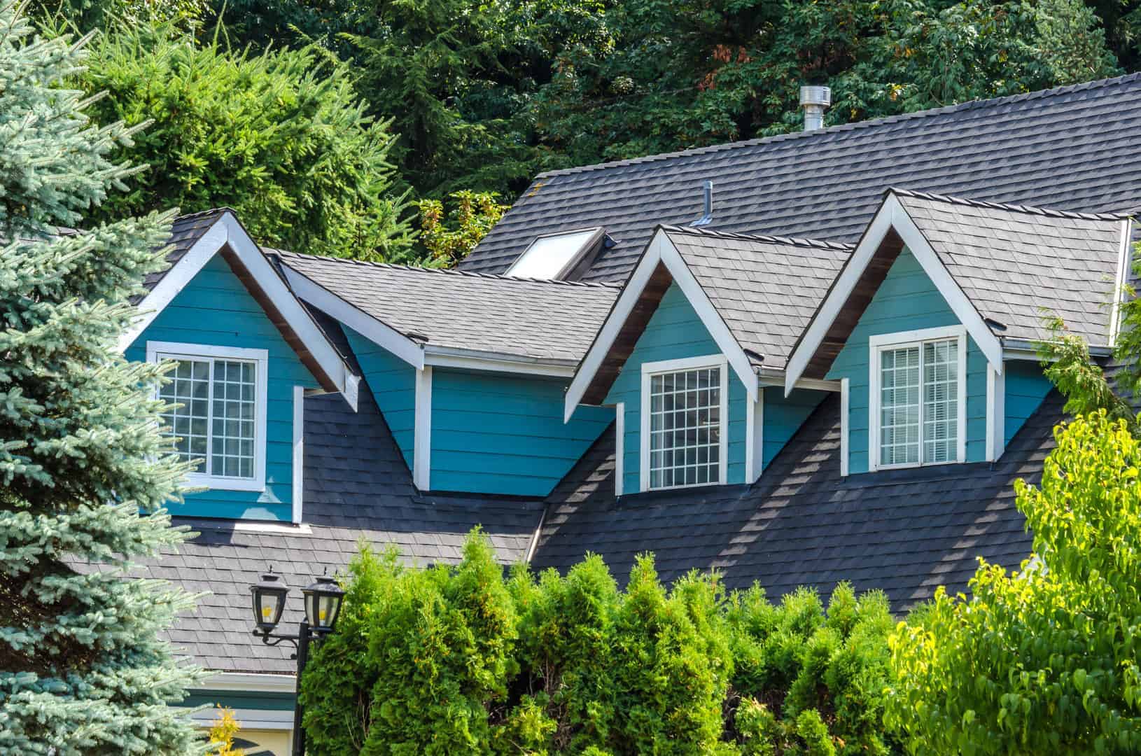 Denver roof with skylight and dormers after roof replacement