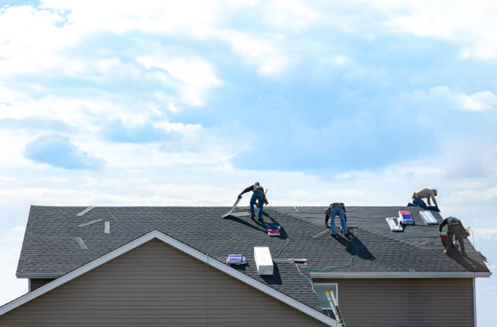 Professional St. Paul roofing contractors installing an asphalt shingle roof.