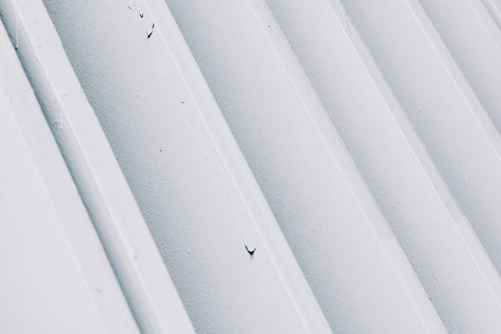 Up close image of a Minneapolis home's white metal roofing