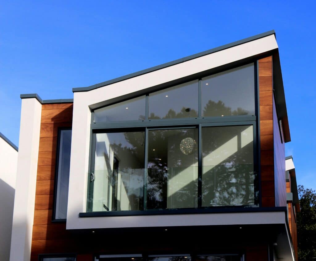 A modern St. Paul home with large windows and composite siding.